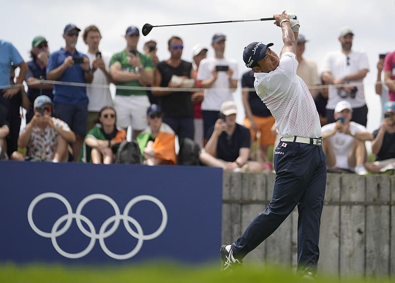 AP photo by George Walker IV / Japan's Hideki Matsuyama hits his shot on the 18th tee at Le Golf National during the first round of the men's tournament at the Paris Olympics on Thursday in Saint-Quentin-en-Yvelines, France.