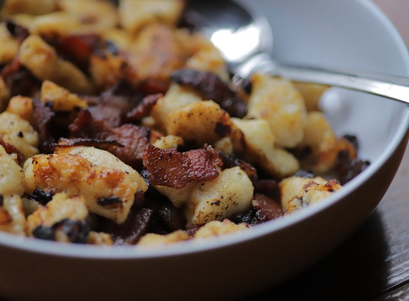 Kopytka, or Little Hooves, served with crispy fried shallots and bacon
(Arkansas Democrat-Gazette/John Sykes Jr.)