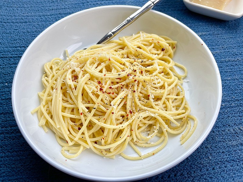 Pasta With Butter and Parmesan garnished with parmesan, red pepper flakes and black pepper  (Arkansas Democrat-Gazette/Kelly Brant)