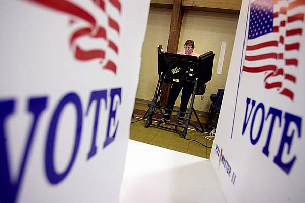 Marie Chandler of Bentonville votes in the 34th precinct in the non-presidential primaries Tuesday, May 18, 2010 at First Baptist Church near the square in Bentonville.  Chandler said she voted for Blanche Lincoln in the senate race.  "She's done more for the state than John Paul Hammerschmidt," she said.