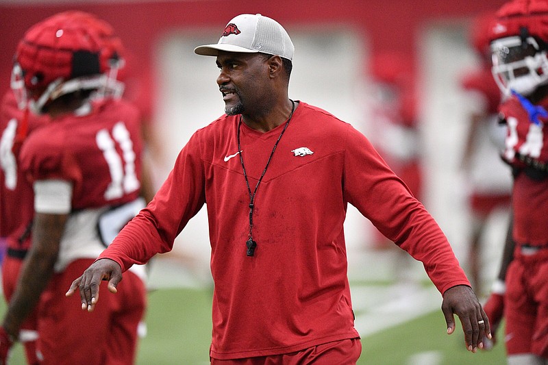 Arkansas assistant coach Marcus Woodson directs his players Tuesday, Aug. 8, 2023, during practice inside the Willard and Pat Walker Pavilion on the university campus in Fayetteville. Visit nwaonline.com/photo for today's photo gallery. .(NWA Democrat-Gazette/Andy Shupe)