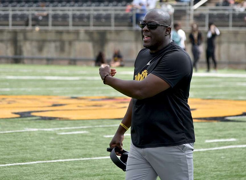 UAPB football Coach Alonzo Hampton directs the team in an April 27 spring game at Simmons Bank Field at Golden Lion Stadium. (Pine Bluff Commercial/I.C. Murrell)