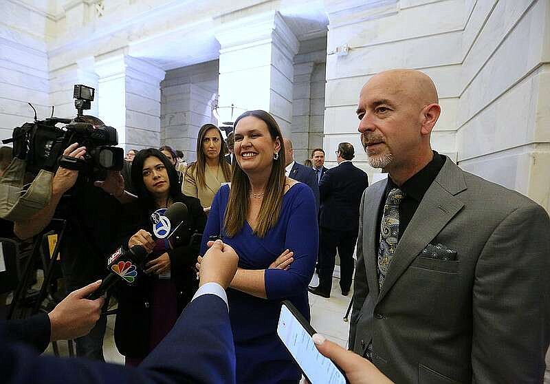 Gov. Sarah Huckabee Sanders (center) and Secretary of Education Jacob Oliva (right) answer questions about the education bill following Sanders speech to homeschoolers on Tuesday, Feb. 21, 2023, at the state Capitol in Little Rock. (Arkansas Democrat-Gazette/Thomas Metthe)