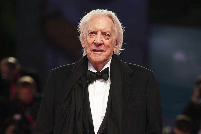 FILE - Actor Donald Sutherland appears at the premiere of the film "The Burnt Orange Heresy" at the 76th edition of the Venice Film Festival, Venice, Italy, on Sept. 7, 2019. Sutherland, the towering Canadian actor whose career spanned "M.A.S.H." to "The Hunger Games," has died at 88.  (Photo by Arthur Mola/Invision/AP, File)