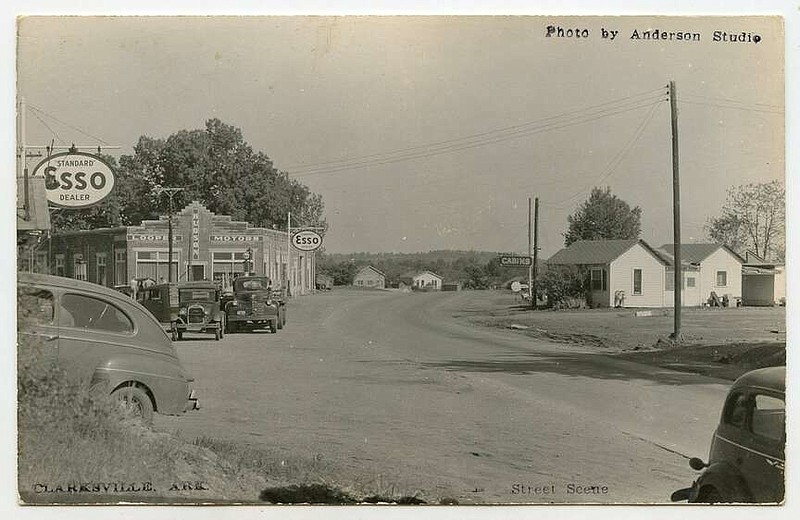 Clarksville, circa 1940: Before the coming of Interstate 40, U.S. 64 brought heavy traffic by the ESSO station and Looper Motors (on the left) and the rental cabins (on the right). The Looper Motors building, since repurposed, still stands today.

Send questions or comments to Arkansas Postcard Past, P.O. Box 2221, Little Rock, AR 72203