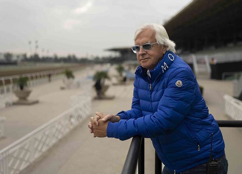 FILE - Trainer Bob Baffert stands for a photo ahead of the Breeders' Cup horse races at Santa Anita in Arcadia, Calif., Oct. 27, 2023. Churchill Downs has rescinded its extended suspension of Baffert, allowing the Hall of Fame trainer to resume racing his horses at the historic track and partner facilities. (AP Photo/Jae C. Hong, File)