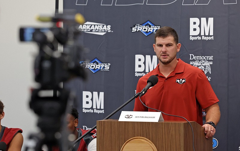 Beebe football Coach Justin Bigham addresses media members on Friday at First Community Bank on Chenal Parkway in Little Rock.
(Arkansas Democrat-Gazette/Colin Murphey)