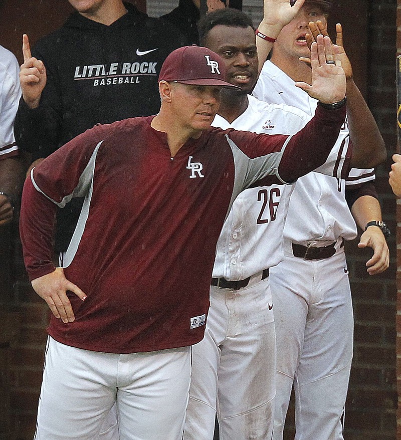 Despite recent setbacks, UALR baseball coach Chris Curry (right) said he is feeling optimistic about his team as it enters Ohio Valley Conference play today against Morehead State.
(Arkansas Democrat-Gazette/Thomas Metthe)