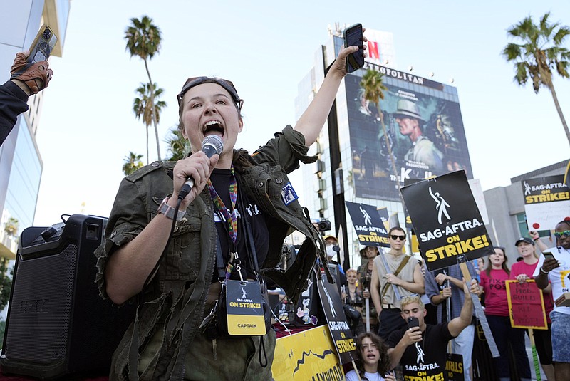 SAG-AFTRA captain Mary M. Flynn rallies fellow striking actors on a picket line outside Netflix studios in Los Angeles on Wednesday, Nov. 8, 2023. (AP/Chris Pizzello)