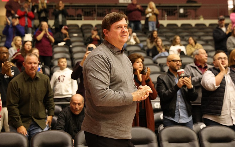 Joe Foley, head coach of the women's basketball team at the University of Arkansas at Little Rock, acknowledges the crowd during the dedication of the home court in his name before a game against Ole Miss at the Jack Stephens Center in this Nov. 13, 2022, file photo. (Arkansas Democrat-Gazette/Colin Murphey)