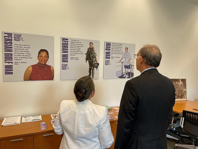 Veterans History Project director Monica Mohindra, left, and U.S. Sen. John Boozman, R-Ark., discuss some of the veterans whose accounts are part of the Library of Congress’ collection.