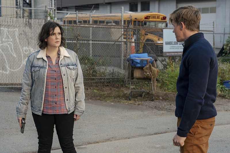 Melanie Lynskey (left) and Warren Kole perform in a scene from Showtime’s “Yellowjackets.” The show is among several viewers have to choose from on TV right now. (Colin Bentley/Showtime via AP)